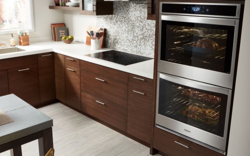 Stainless steel double wall oven in a contemporary kitchen