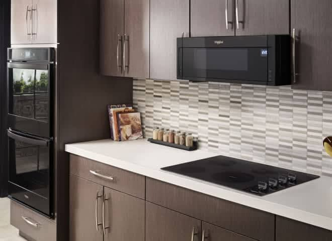 An electric cooktop built into a kitchen cabinet