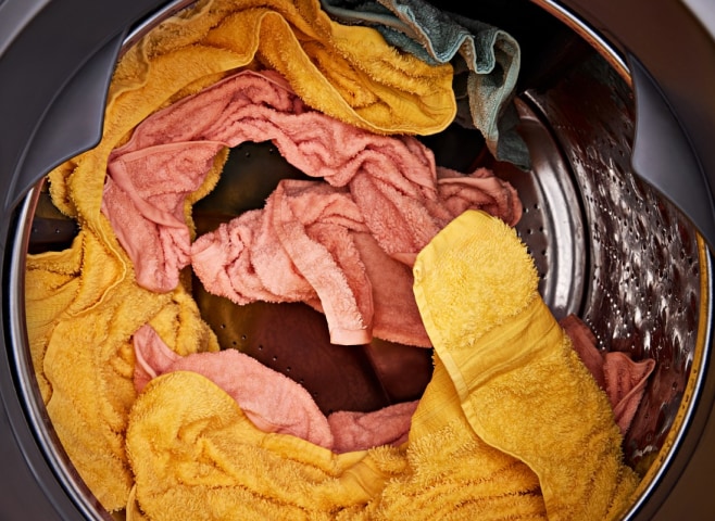 A closeup of items drying in a Whirlpool® dryer