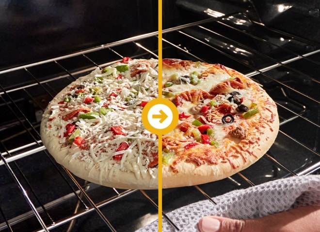 Pizza baking in an oven.