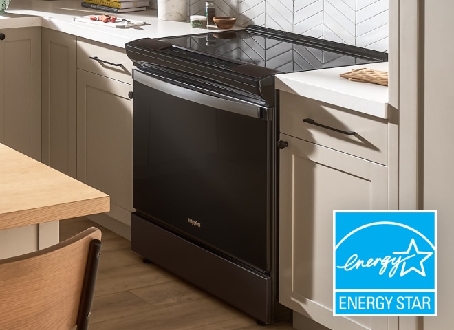 A Whirlpool® range in a kitchen with an ENERGY STAR® badge.