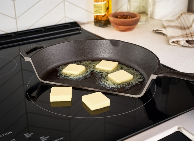 Cubes of butter melting on a cooktop