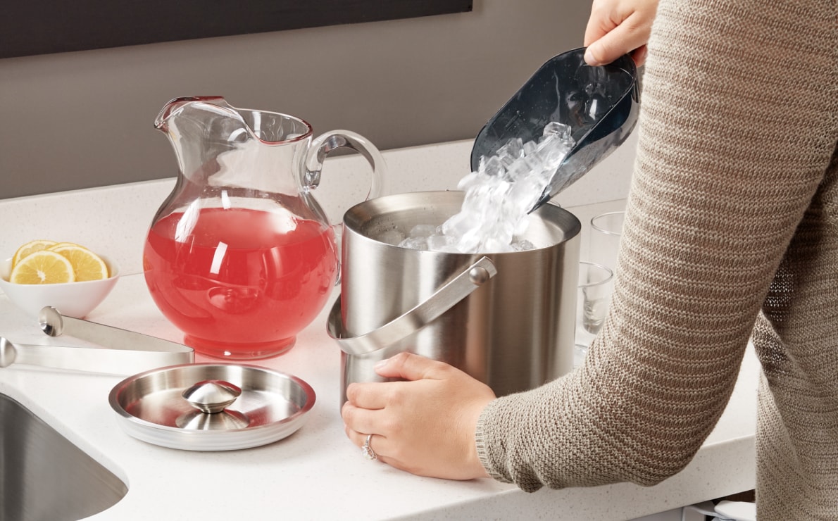 Ice bucket on the countertop.