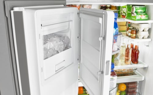 Close-up of open in-door ice bin full of ice 