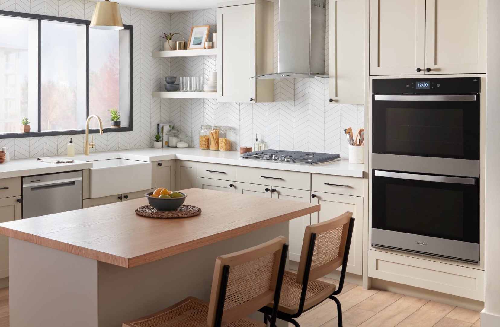 A bright modern kitchen full of Whirlpool® Kitchen Appliances