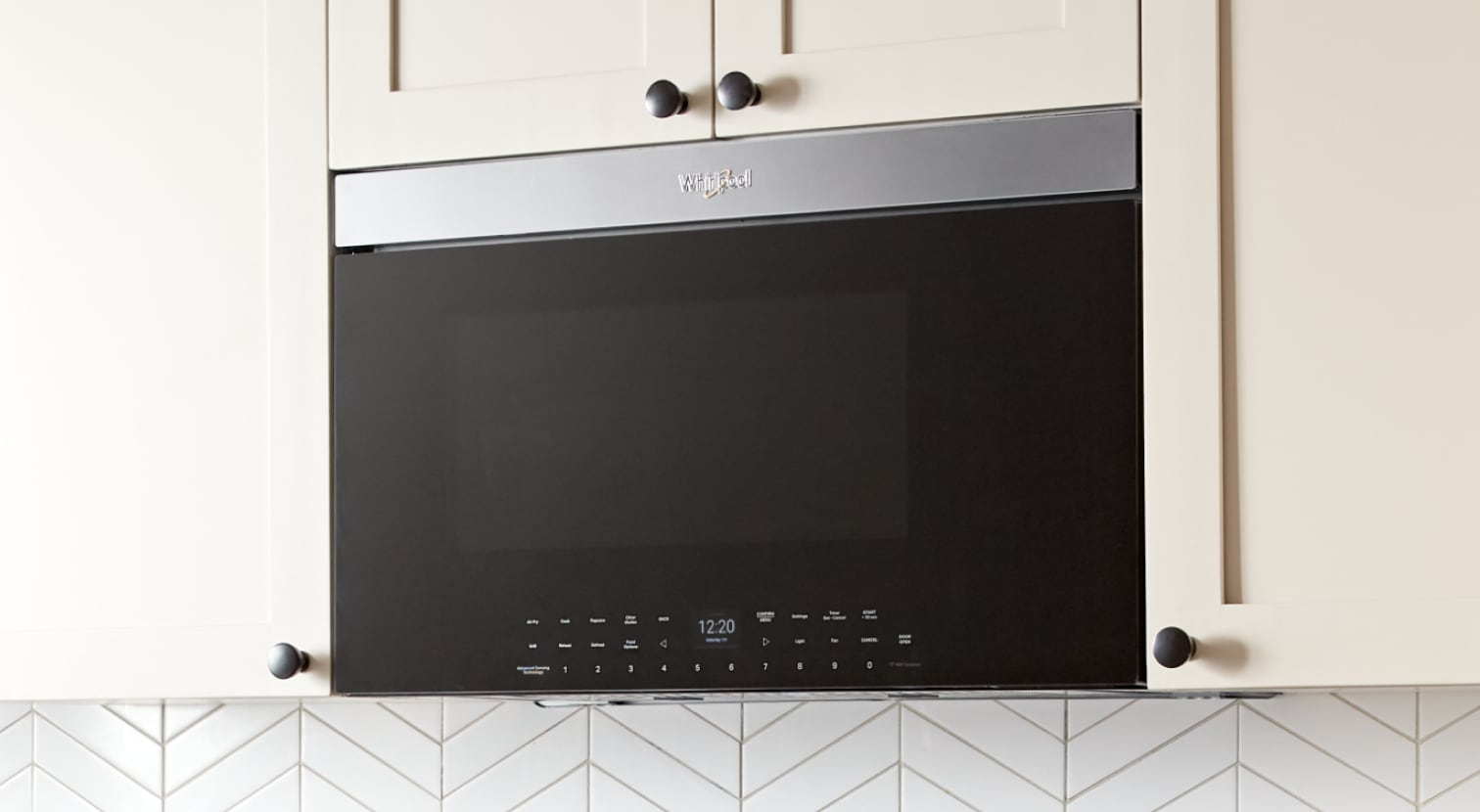 Closeup of a Whirlpool® Flush Built-In Over-the-Range Microwave