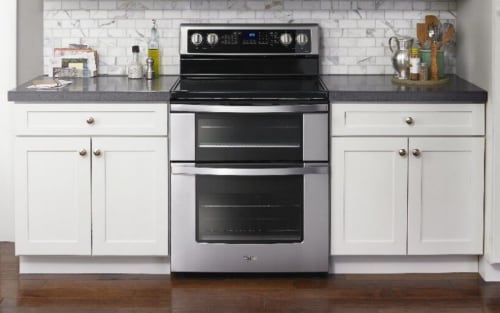 Whirlpool brand double oven range in modern kitchen