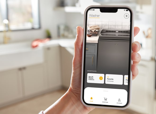 A phone with the Whirlpool® Smart Appliance app pulled up