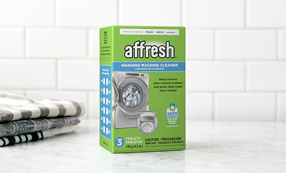 Affresh washing machine cleaner on a countertop.