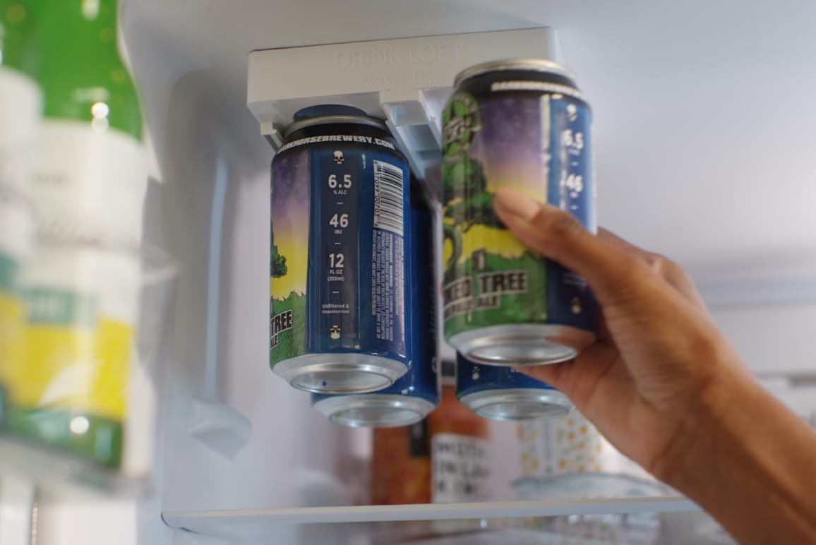 A Whirlpool® small space refrigerator with Drink Loft™ storage.