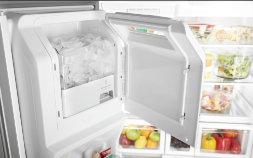 Freezer open to show icemaker