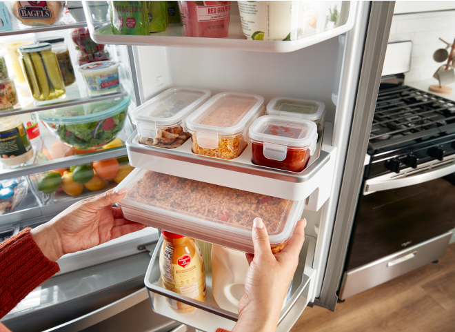 A Whirlpool® French Door Refrigerator with Prep & Store Bins